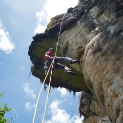 Rapelling down a rock wall in Suesca